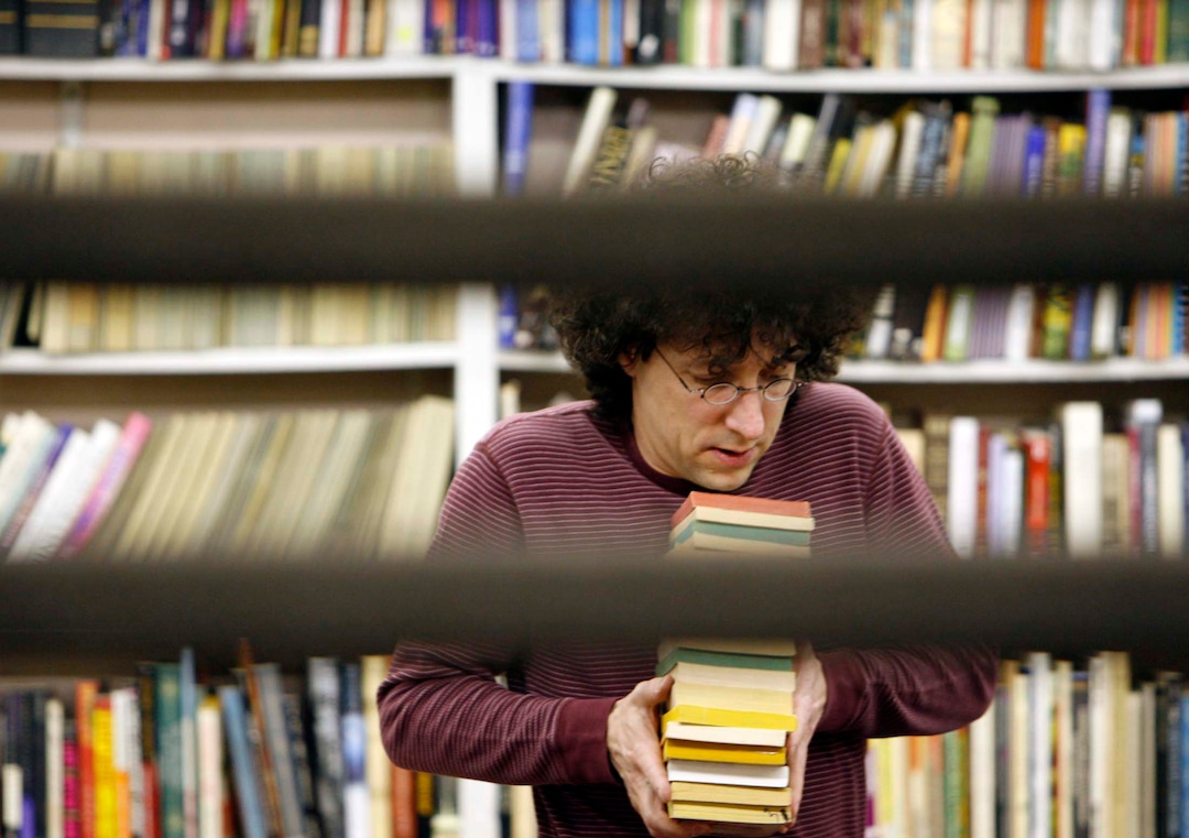 (Trent Nelson | Tribune file photo) Tony Weller is photographed at Sam Weller's Bookstore, March 23, 2006.