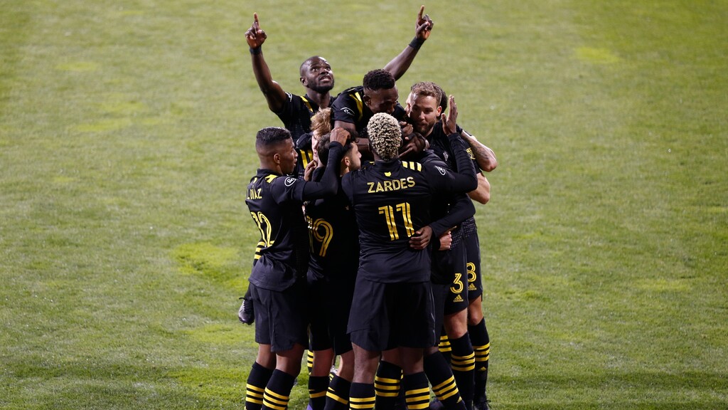 Columbus Crew players celebrate a goal against the Seattle Sounders during the first half of the MLS Championship soccer match Saturday, Dec. 12, 2020, in Columbus, Ohio. (AP Photo/Jay LaPrete)