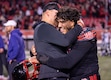(Rick Egan | The Salt Lake Tribune) Utah Jim Harding assistant coach hugs offensive lineman Spencer Fano (55) as they celebrate the Utes' win over Kansas State.
