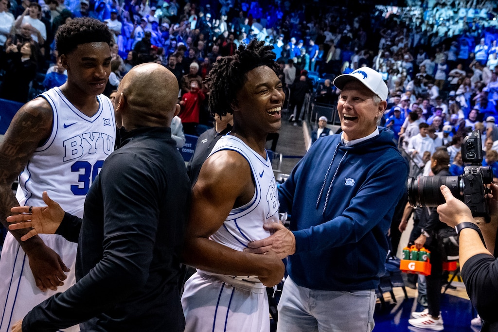(Trent Nelson  |  The Salt Lake Tribune) BYU Cougars guard Robert Wright III (1) and Danny Ainge, celebrating the win, as BYU hosts Texas Tech, NCAA basketball in Provo on Saturday, March 7, 2026.