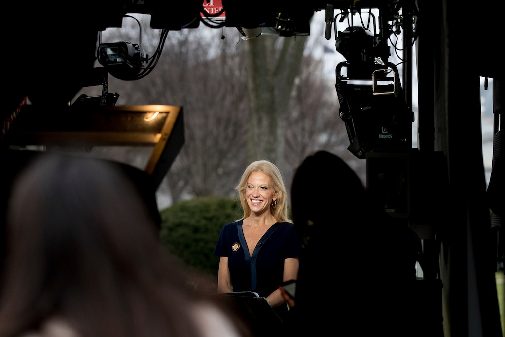Trump adviser Kellyanne Conway gets ready to speak live on television outside the White House, Sunday, Jan. 22, 2017, in Washington. (AP Photo/Andrew Harnik)