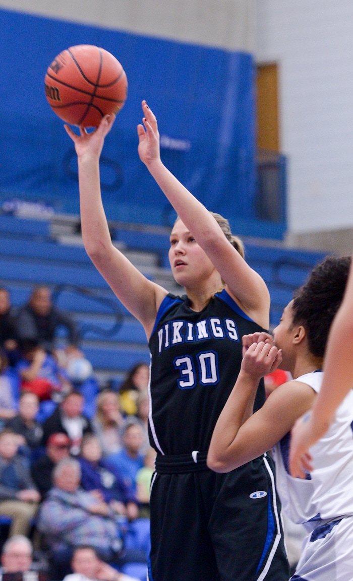 (Leah Hogsten  |  The Salt Lake Tribune)  Pleasant Grove's Kaylynn Loder aims for the net.   Copper Hills High School girls' basketball team defeated Pleasant Grove High School 66-25 during their Class 6A girls' basketball playoff opener at Salt Lake Community College Tuesday, Feb. 20, 2018. 