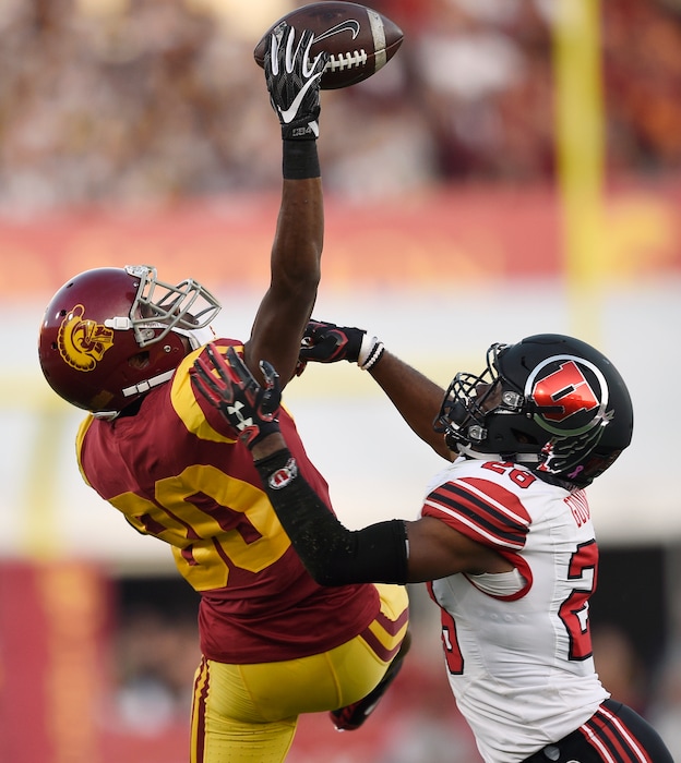 Utah defensive back Javelin Guidry, right, breaks up a pass intended for Southern California wide receiver Deontay Burnett during the first half of an NCAA college football game in Los Angeles, Saturday, Oct. 14, 2017. (AP Photo/Kelvin Kuo)