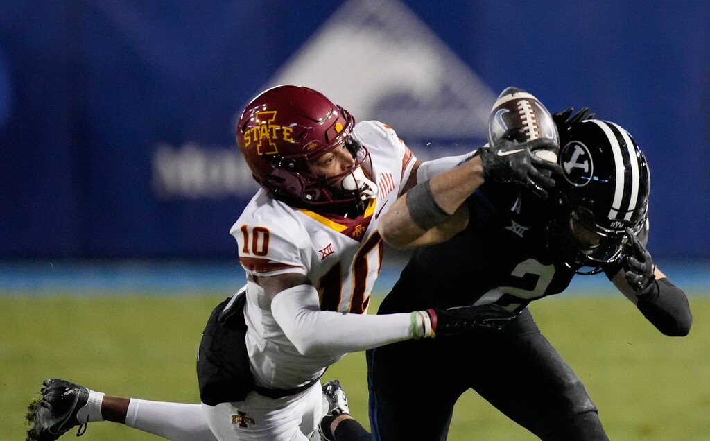 (Francisco Kjolseth | The Salt Lake Tribune) Iowa State Cyclones defensive back Darien Porter (10) breaks up a pass intended for Brigham Young Cougars wide receiver Chase Roberts (2) during an NCAA college football game on Saturday, Nov. 11, 2023, in Provo, Utah.