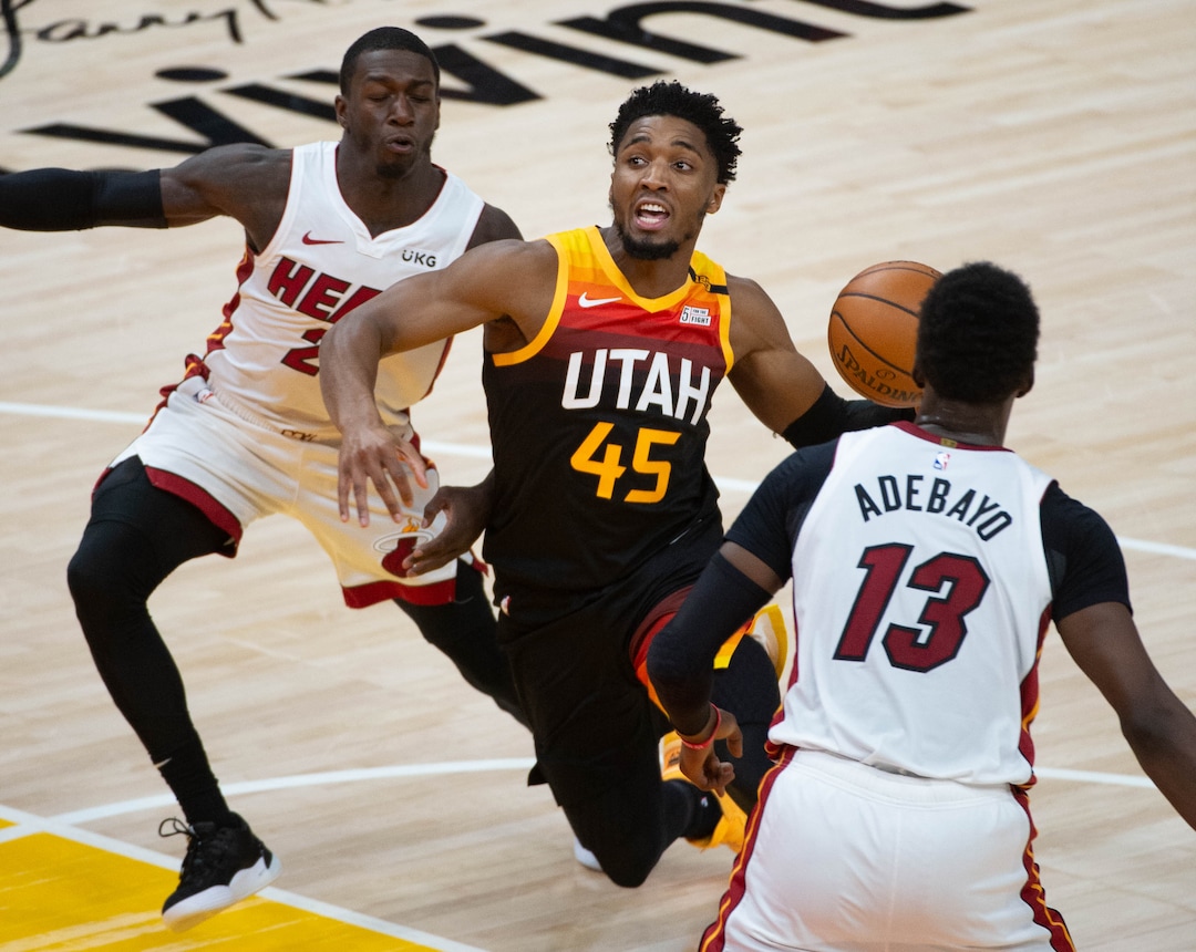 (Francisco Kjolseth  | The Salt Lake Tribune) Utah Jazz guard Donovan Mitchell (45) pushes past the defense as the Utah Jazz take on the Miami Heat at Vivint Smart Home Arena in Salt Lake City, on Saturday, Feb. 13, 2021.