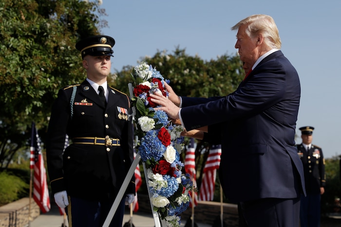 (Evan Vucci | AP Photo) President Donald Trump and first lady Melania Trump place a wreath  and will participate in a moment of silence honoring the victims of the Sept. 11 terrorist attacks, Wednesday, Sept. 11, 2019, at the Pentagon.