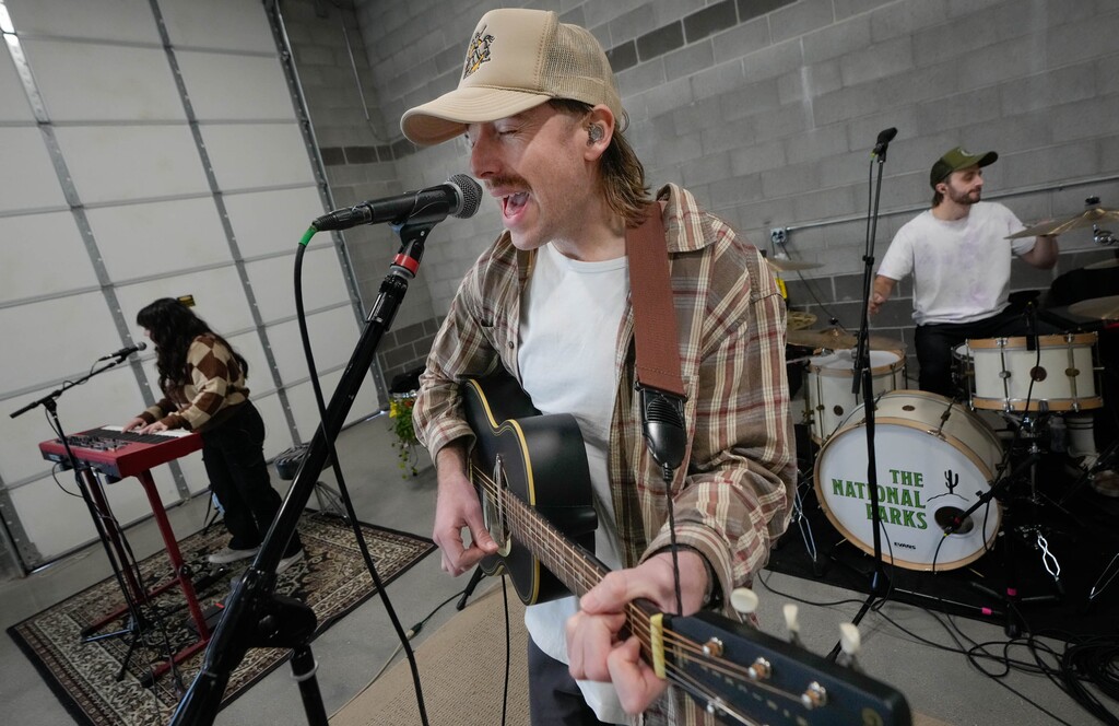 (Francisco Kjolseth | The Salt Lake Tribune) The National Parks lead singer and guitarist, Brady Parks, center, singer and keyboardist, Sydney Macfarlane and drummer Cam Brannelly practice one of their songs on Feb. 14, 2023. The band's third annual Superbloom Music Festival is scheduled for Saturday, Sept. 23, 2023, at the Gallivan Center in Salt Lake City.