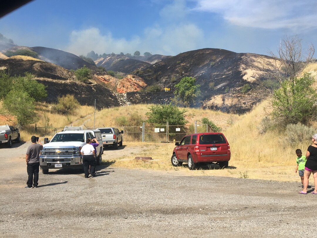 (James Semerad | For The Tribune) Hills are scarred by a fire near the Utah Capitol on Tuesday, July 24, 2018.