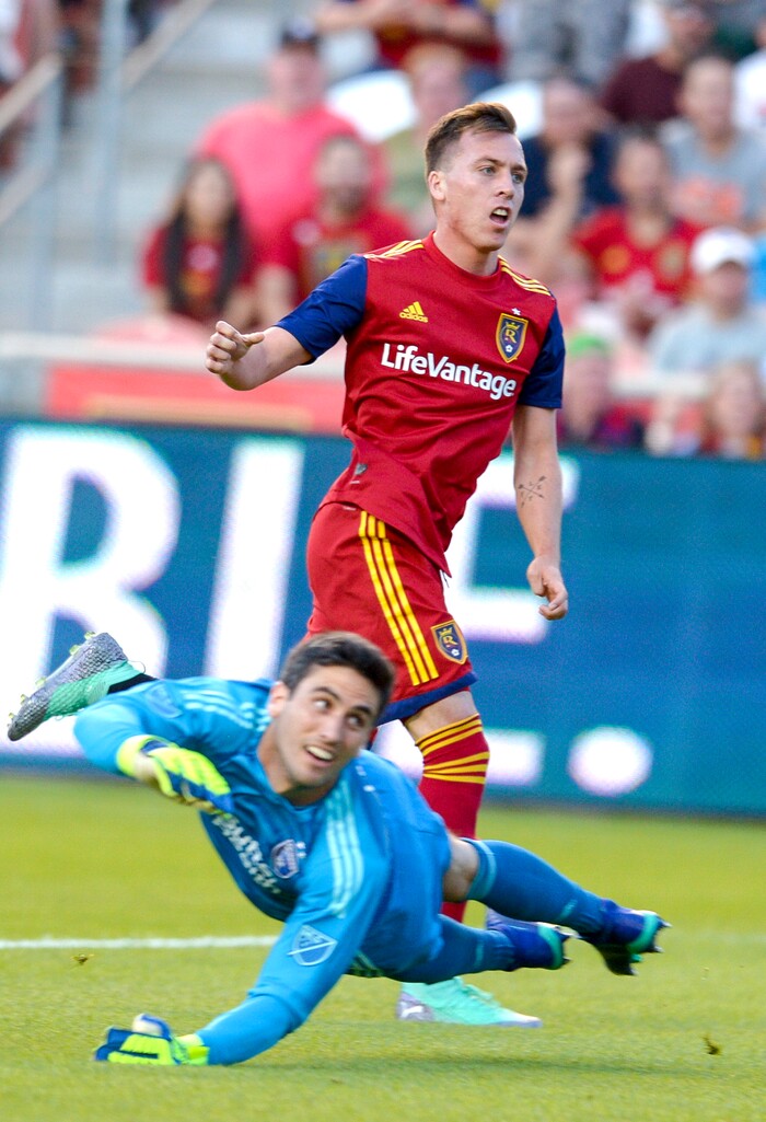 Leah Hogsten | The Salt Lake Tribune Real Salt Lake forward Corey Baird (27) watches as his kick sails over San Jose Earthquakes goalkeeper Andrew Tarbell (28) and the net as Real Salt Lake hosts the San Jose Earthquakes at Rio Tinto Stadium in Sandy, Utah, Saturday, June 23, 2018.
