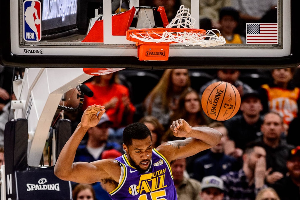 (Trent Nelson | The Salt Lake Tribune)  Utah Jazz forward Derrick Favors (15) dunks. The Utah Jazz host the Houston Rockets, NBA basketball in Salt Lake City on Thursday Dec. 6, 2018.