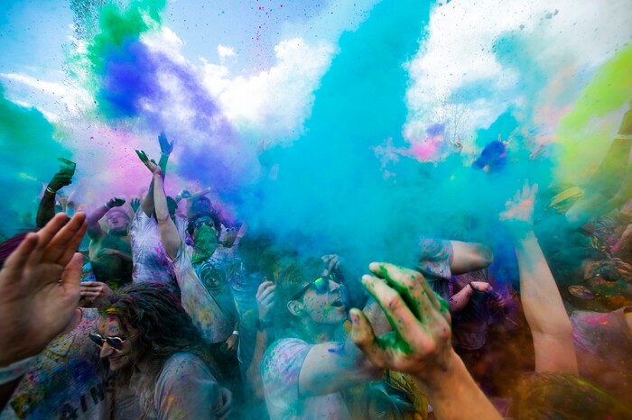 (Rick Egan  |  The Salt Lake Tribune)   Revelers toss colored powder into the air as they celebrate the arrival of spring, during the Holi Festival of Colors celebration at the Sri Sri Radha Krishna Temple in Spanish Fork, Saturday, March 30, 2019.


