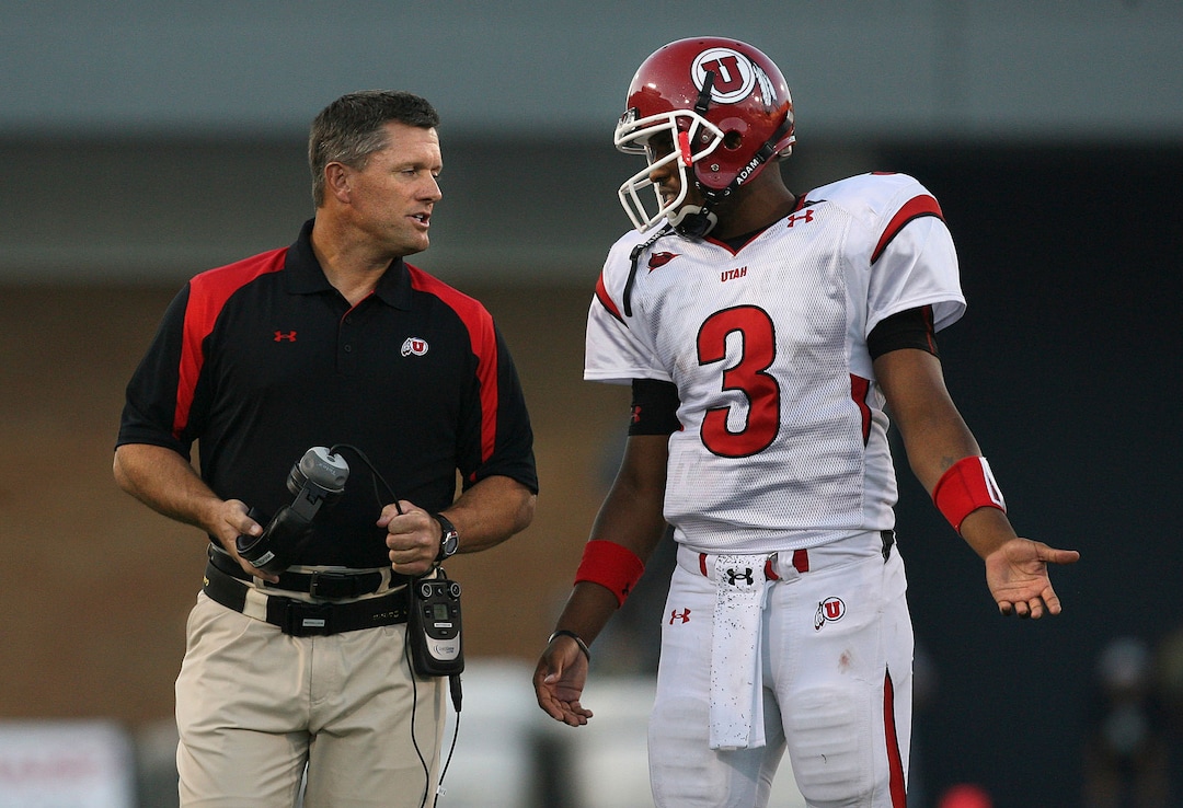 UTAH at UTAH STATEHead coach Kyle Whittingham and QB Brian Johnson confer during a timeout in the first half.The Utes held a 30-7 halftime lead after being behind briefly at 7-0.Scott Sommerdorf / The Salt Lake Tribune