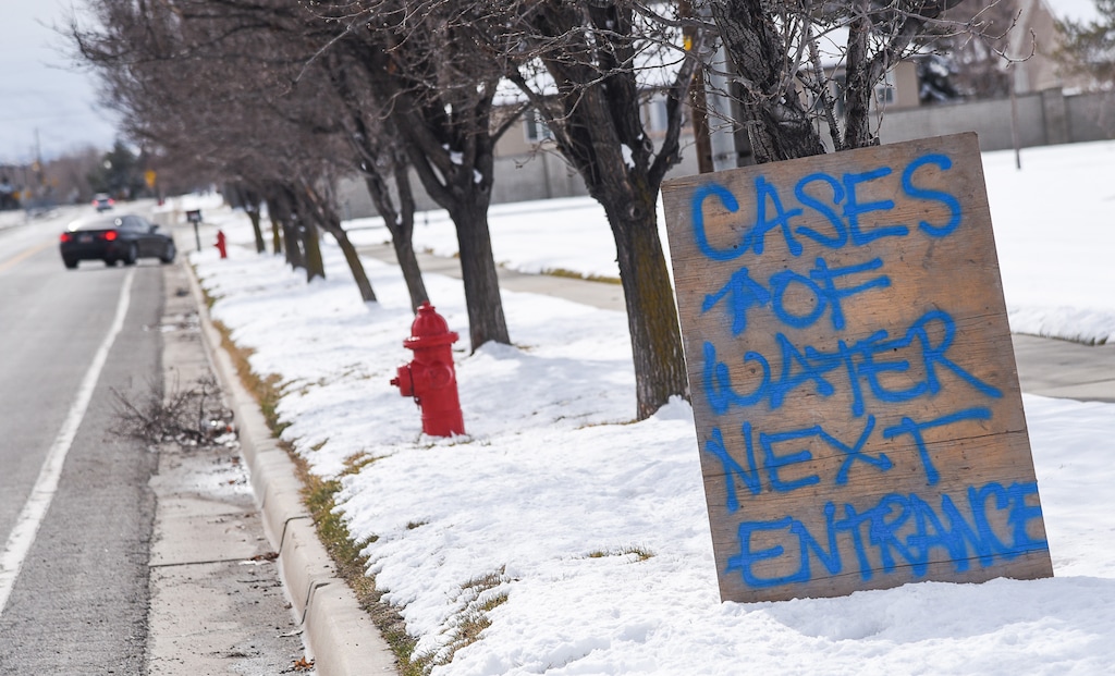 (Francisco Kjolseth | The Salt Lake Tribune) Cases of water are stored at the Sandy Operations Center at 9150 South, 150 East on Sunday, Feb. 17, 2019 for residents to drive thru and pick up. The no drink order now applies only to homes and businesses between 1700 East and 2000 East and 10600 South and 11400 South, the city announced Sunday. The city says the problem started about Feb. 6, when a fluoride pump malfunctioned because of a power outage. It flooded the water system with fluoride and that also led to high levels of lead and copper, enough that it made some people sick.