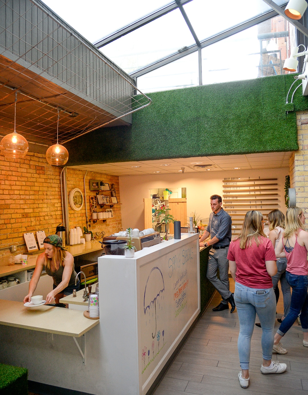 (Francisco Kjolseth  |  The Salt Lake Tribune)  Cupla Coffee opened about a year ago in the basement of the Axis Business Building across from the Salt Palace Convention Center. It's owned and operated by twin sisters Abby Purdie & Bethany Heath, at left. They roast the coffee beans (at a separate location) and make all the baked items, catering to people with gluten-free, vegan, keto diets.