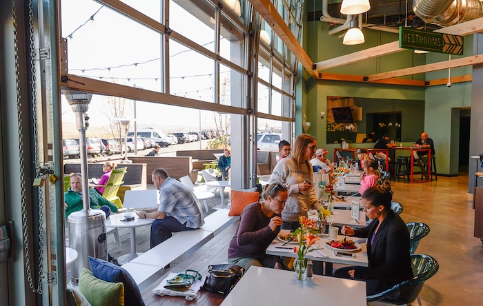 (Francisco Kjolseth  |  The Salt Lake Tribune)  The new Park City Whole Foods, which opened down the street from the original, includes the Silver Mine Tap Room, a family-friendly restaurant with 24-beers on tap and an open floor layout with garage doors to connect out into the patio area. 