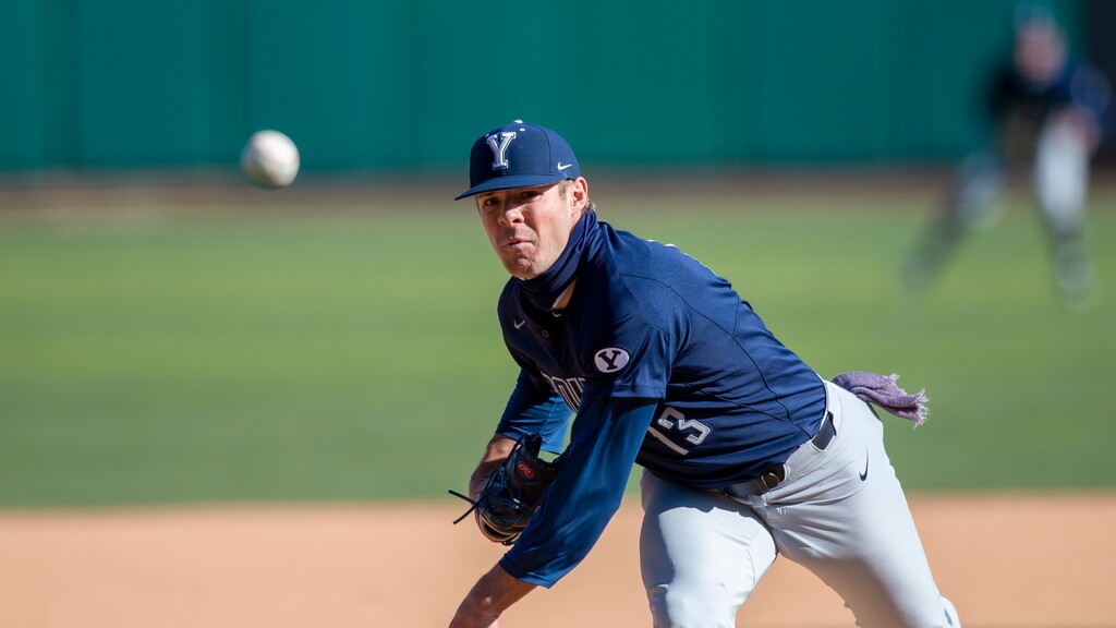 (Tyler Tate | AP) Brigham Young University's Cy Nielson (13) pitches during an NCAA baseball game on Friday, March 12, 2021 in Salt Lake City.