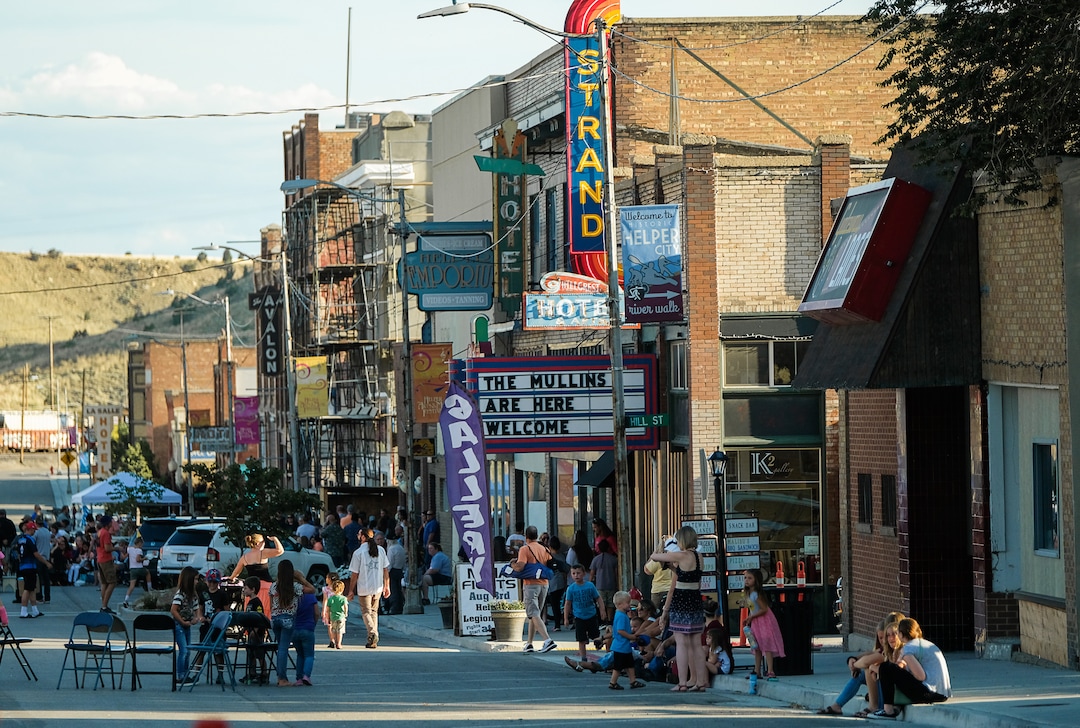 (Francisco Kjolseth  |  The Salt Lake Tribune)  Helper First Fridays draws people to historic Main Street on Friday, Aug. 2, 2019, for their monthly gallery stroll where the small town has been discovered by a variety of artists and dreamers seeking to escape the hustle of the Wasatch Front, lured by cheap real estate prices. Helper today resembles Park City in the late 1960s. Some aging, empty buildings remain, but newcomers joining natives are slowly reinventing the little town of just over 2,000 residents as an artist colony and tourist destination.