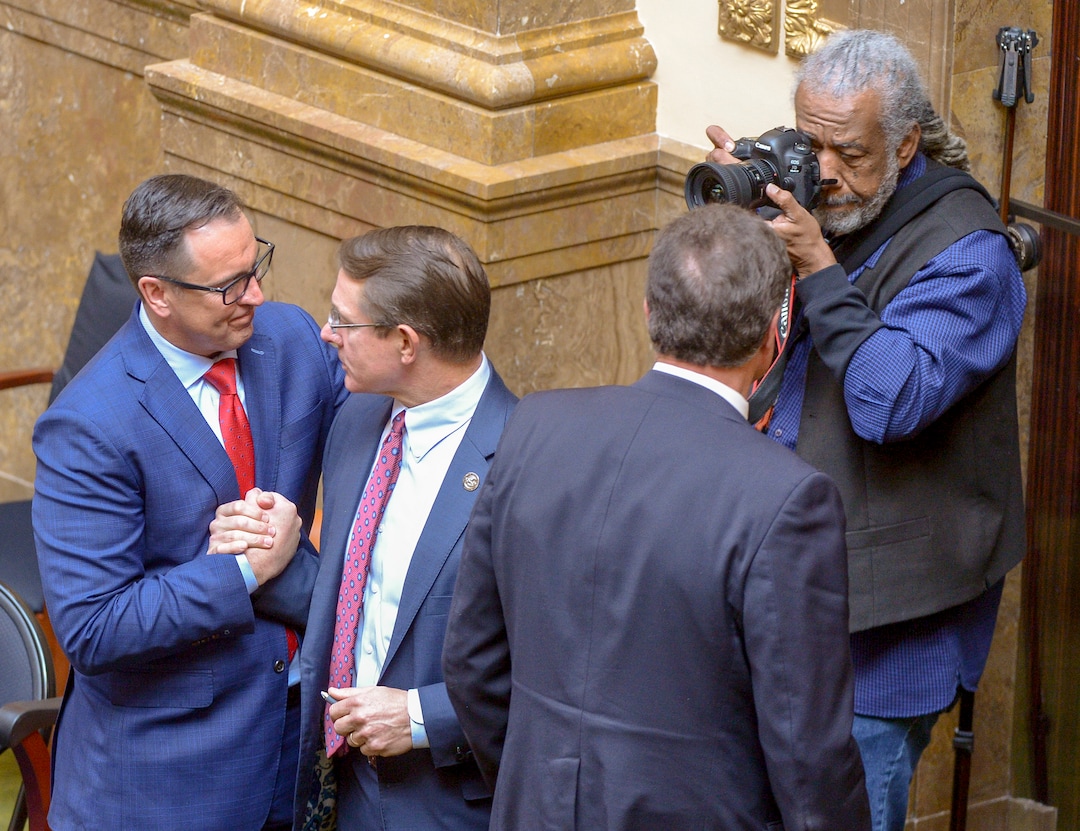 (Leah Hogsten  |  The Salt Lake Tribune)  L-r  House Speaker Greg Hughes, R-Draper celebrates the passing of his medical cannabis bill in the House with Rep. Ken Ivory, R-West Jordan.  Utah legislators voted to change the Utah Medical Cannabis Act, the bill that officials, Prop 2 opponents and medical marijuana advocates crafted and pitched as a compromise, Monday, Dec. 2, 2018 during a special session. Lawmakers voted for an overwritten version of the ballot initiative.
