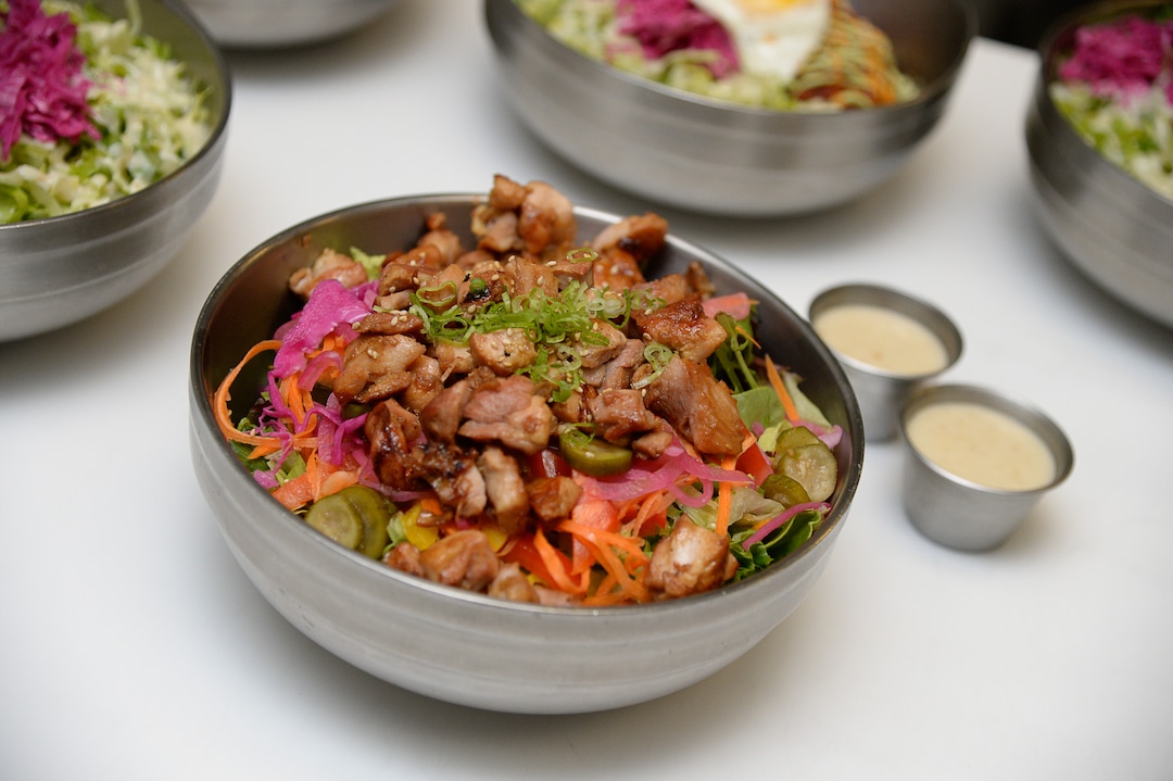(Francisco Kjolseth  |  The Salt Lake Tribune)  House salad with garlic/ginger chicken at the Angry Korean fusion restaurant in South Jordan.