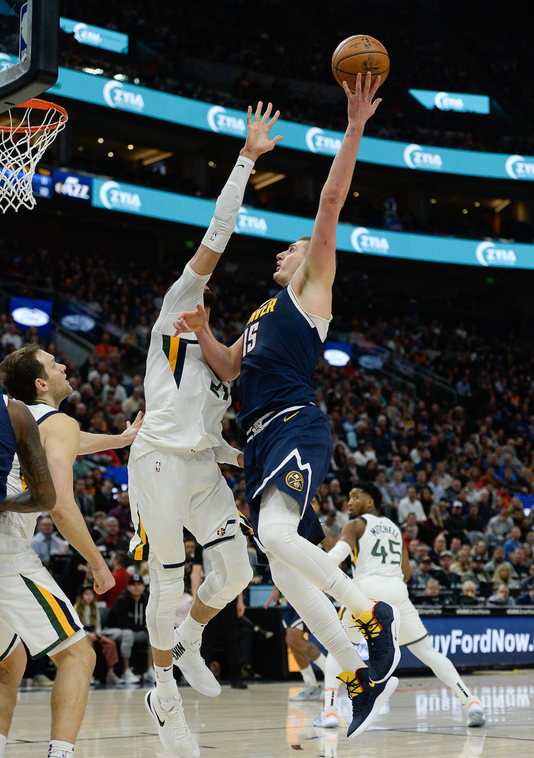 (Francisco Kjolseth  |  The Salt Lake Tribune) Utah Jazz center Rudy Gobert (27) guards Denver Nuggets center Nikola Jokic (15) as the Utah Jazz host the Denver Nuggets in their NBA basketball game at Vivint Smart Home Arena in Salt Lake City on Wednesday, Feb. 5, 2020.