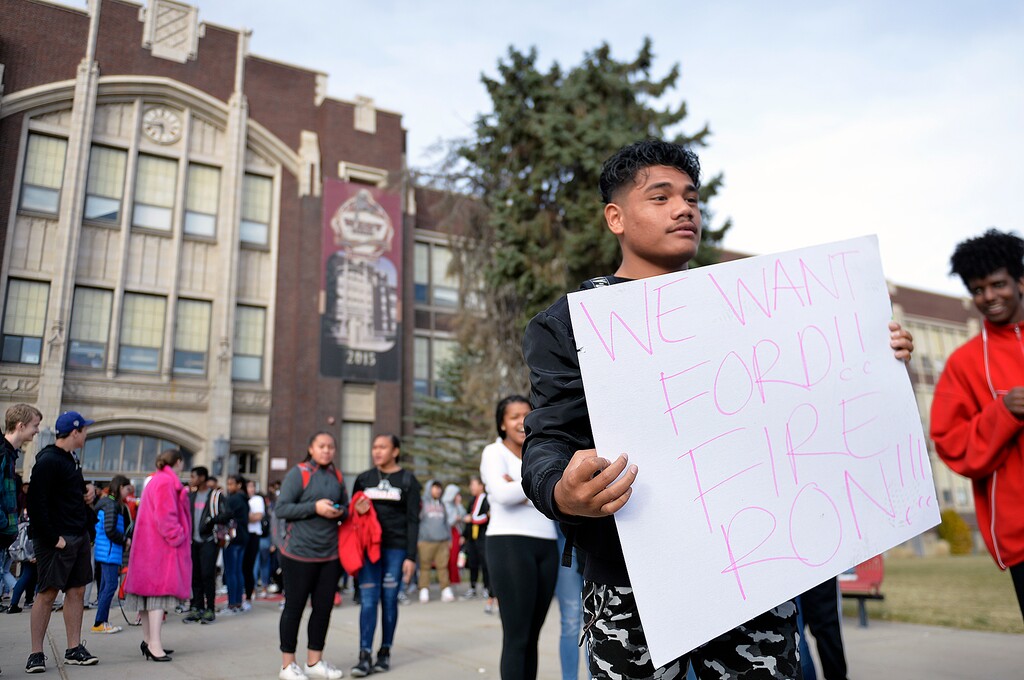 (Chris Samuels | The Salt Lake Tribune) A student carries a sign in support of principal Ford White during a walkout at West High School in Salt Lake City, Tuesday, Nov. 19, 2019.