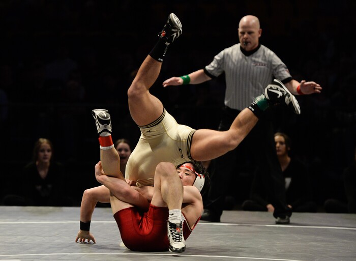 (Francisco Kjolseth  |  The Salt Lake Tribune)  Zak Kohler of Wasatch is flipped over by Shion Abe of Viewmont in the Class 5A 138 weight class state wrestling championship match at the Utah Valley University UCCU Center on Thursday, Feb. 8, 2018.