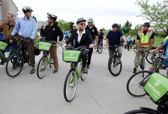 (Francisco Kjolseth | The Salt Lake Tribune) Salt Lake City Mayor Jackie Biskupski is joined by members of the public and city employees on Thursday, May 16, 2019, as part of the annual Mayor’s Bike to Work Day. This year’s ride began at the Northwest Recreation Center and ran primarily along the Jordan River Trail in an effort to show off the investments the city and others have made to the trail.