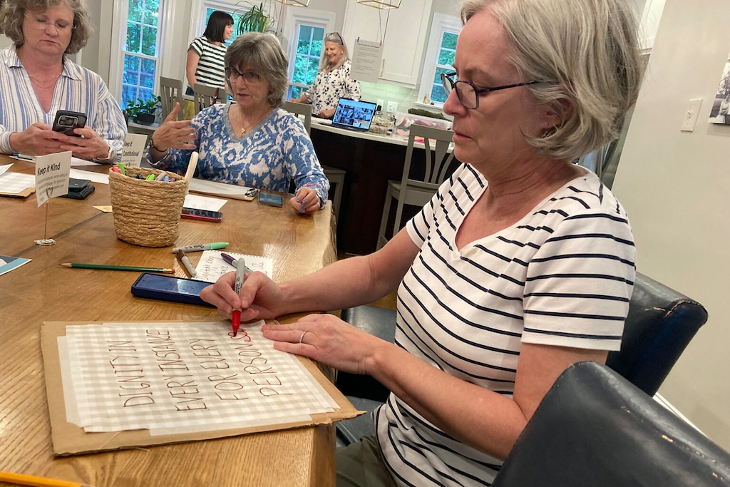 (Yonat Shimron | Religion News Service) Alisyn Rogerson, right, designs a quilt square in Durham, N.C., on April 25, 2025.