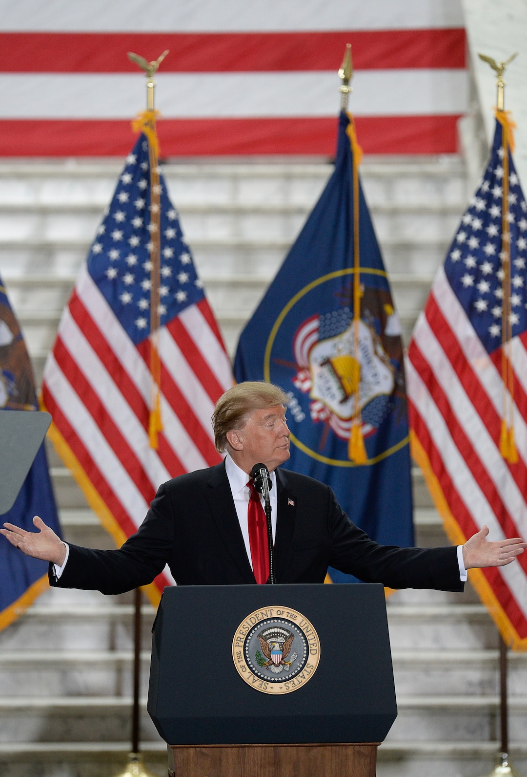 (Francisco Kjolseth  |  The Salt Lake Tribune)  U.S. President Donald Trump takes the stage at the Utah Capitol on Monday, Dec. 4, 2017, to sign a presidential proclamation to shrink Bears Ears and Grand Staircase-Escalante national monuments.