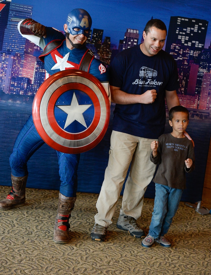 (Francisco Kjolseth  |  The Salt Lake Tribune)  Utah-based military families including Andrew Edtl and his son James, 6, gather for the Salt Lake opening night of the all-new Marvel Universe LIVE! Age of Heroes, witnessing their favorite Marvel super heroes, including Captain America, The Avengers, Spider-Man and the Guardians of the Galaxy in an action-packed adventure at the Maverik Center on Thursday, Sept. 28, 2017. MarvelÕs greatest military Super Hero Captain America was partnered with Got Your 6, a military veteran non-profit group dedicated to empowering veterans to lead and build stronger communities across America.