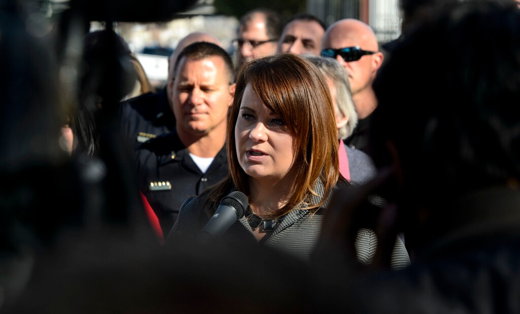 Steve Griffin  |  Tribune file photo

South Salt Lake Mayor Cherie Wood, with a police officer in the background, talks with the media in March, when the city was being selected for one of three homeless resource centers.