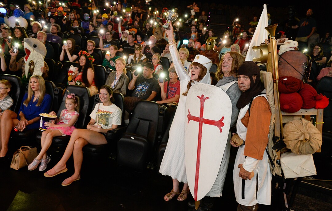 (Francisco Kjolseth  |  The Salt Lake Tribune)  Monty Python and the Holy Grail comes to life through Roxanne and Harold Weir and Frank Buck, from left, as they join the festivities during FanX's twice-annual "press conference," at Megaplex Jordan Commons in Sandy on Wed. June 12, 2019, for the announcement of the event's celebrity visitors.