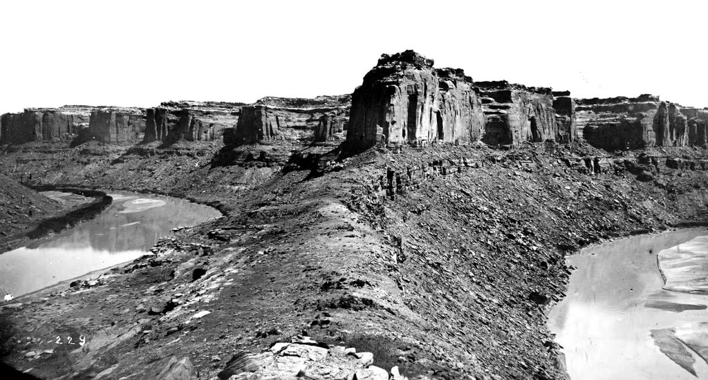 The Green River in Labyrinth Canyon showing the saddle of the Bowknot, photographed by John K. Hillers during Powell's 2nd expedition in 1872. The saddle of the Bowknot. Major John Wesley Powell was a soldier who lost his arm in the Civil War, and went on to become a geology professor, American Indian expert, western conservation advocate, and an explorer who's most famous expedition was a 900-mile journey on the Green and Colorado Rivers in 1870.
