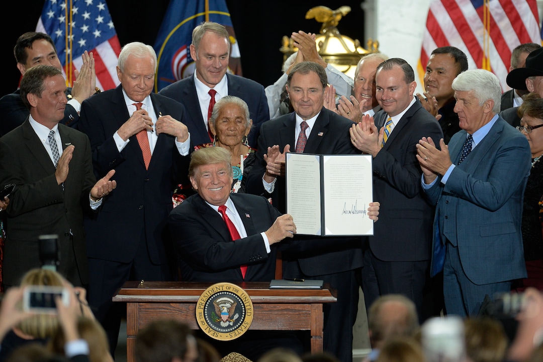 (Francisco Kjolseth  |  The Salt Lake Tribune)  U.S. President Donald Trump is surrounded by Utah representatives at the Utah Capitol on Monday, Dec. 4, 2017, after signing two presidential proclamations to shrink Bears Ears and Grand Staircase-Escalante national monuments.