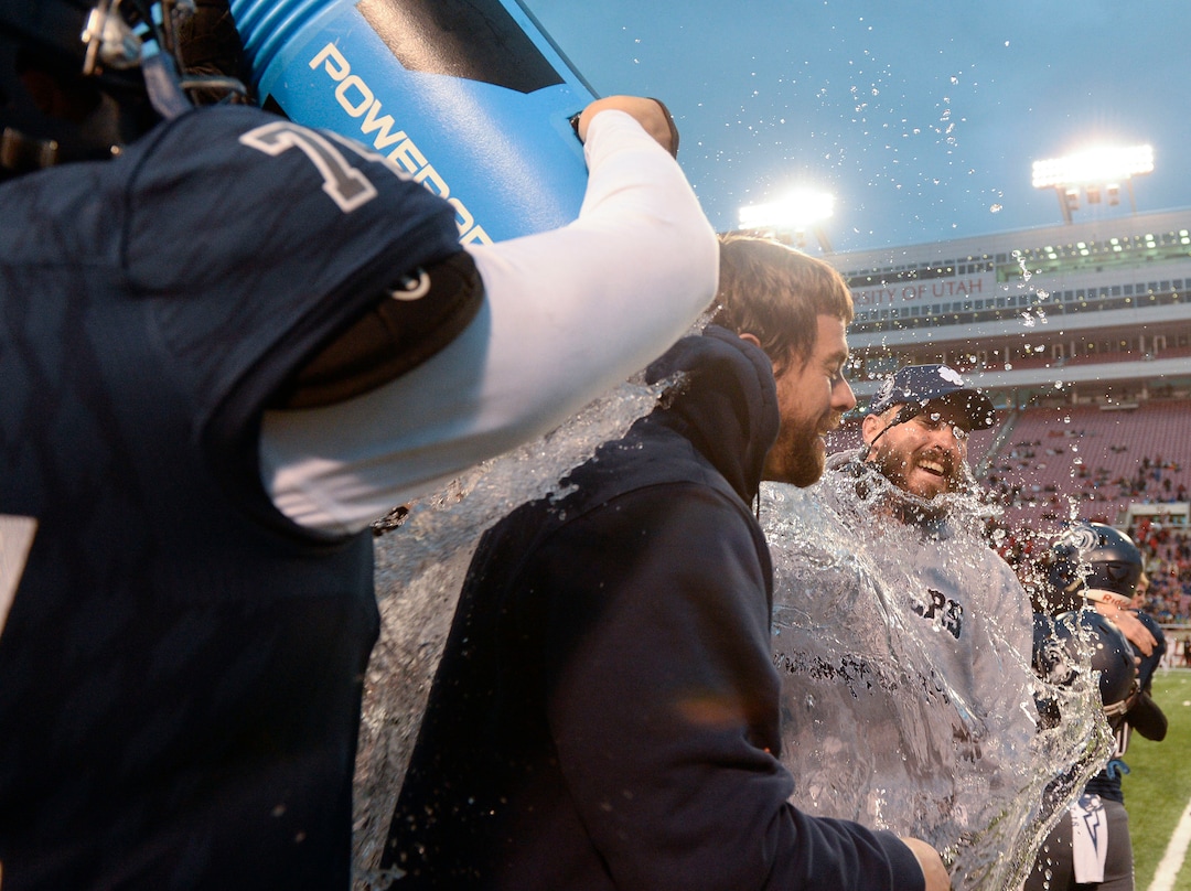 (Leah Hogsten  |  The Salt Lake Tribune)  Corner Canyon head coach Eric Kjar is iced after the win. High School defeated American Fork High School 49-14 during the 6A State Championship football title, Nov. 22, 2019 at Rice-Eccles Stadium.