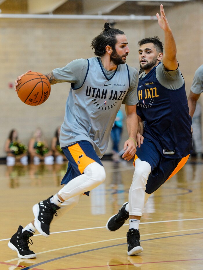 (Steve Griffin  |  The Salt Lake Tribune)    New Jazz guard Ricky Rubio drives into Utah Jazz guard Raul Neto in the Warrior Fitness Center on Hill Air Force Base as they scrimmage as a part of a "Hoops for Troops" promotion Ogden Friday September 29, 2017. It's also Utah's first public scrimmage of the season, and the first look at how the new pieces of the team will work together. 