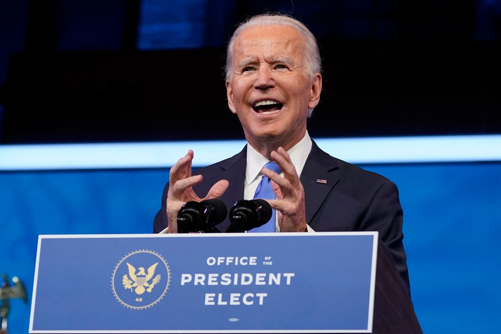 (Patrick Semansky | AP) President-elect Joe Biden speaks after the Electoral College formally elected him as president, Monday, Dec. 14, 2020, at The Queen theater in Wilmington, Del.