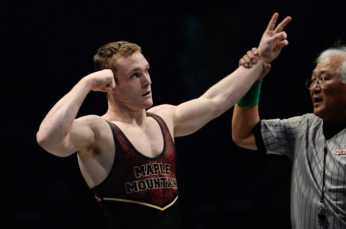 (Francisco Kjolseth  |  The Salt Lake Tribune)  Brandyn Van Tassel of Maple Mountain celebrates his quick win in the Class 5A 182 weight class state wrestling championship match at the Utah Valley University UCCU Center on Thursday, Feb. 8, 2018.