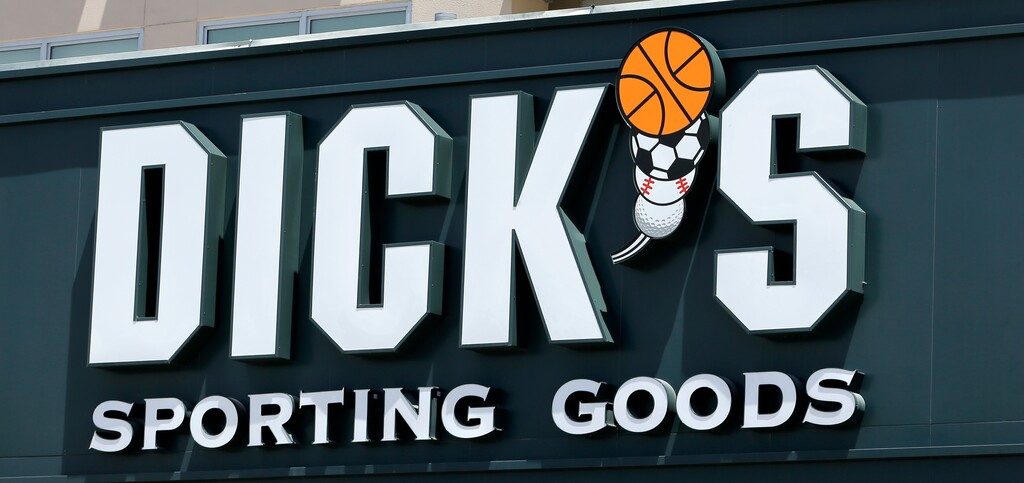 This photo taken Tuesday, Aug. 29, 2017, shows a Dick's Sporting Goods sign at a store in Miami. Dick's Sporting Goods announced Wednesday, Feb. 28, 2018, that it will immediately end sales of assault-style rifles and high capacity magazines at all of its stores and ban the sale of all guns to anyone under 21 years old. The announcement comes two weeks after the school massacre in Parkland, Fla. (AP Photo/Alan Diaz)