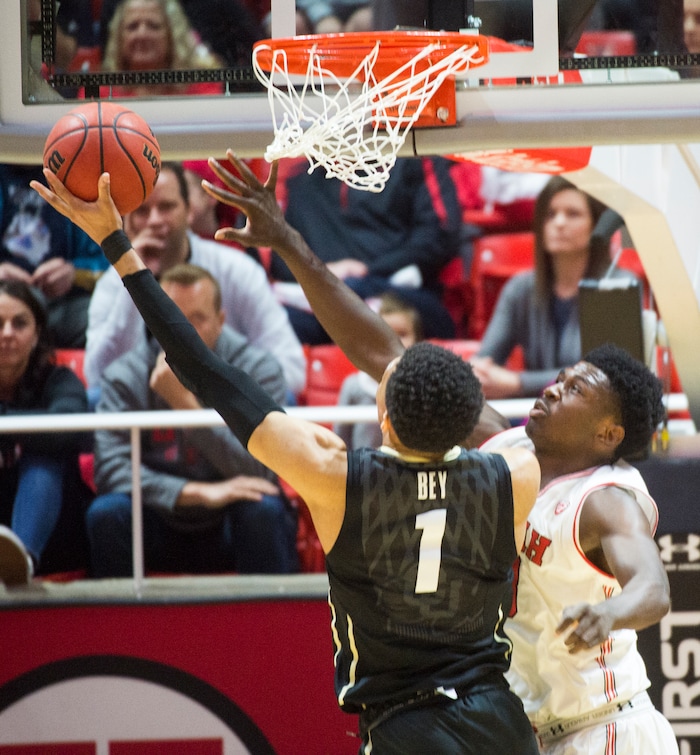 (Rick Egan  |  The Salt Lake Tribune)  Utah Utes forward Donnie Tillman (3) defends as Colorado Buffaloes guard Tyler Bey (1) shoots, in PAC-12 basketball action between Utah Utes and Colorado Buffaloes, at the Jon M. Huntsman Center, Saturday, March 3, 2018.
