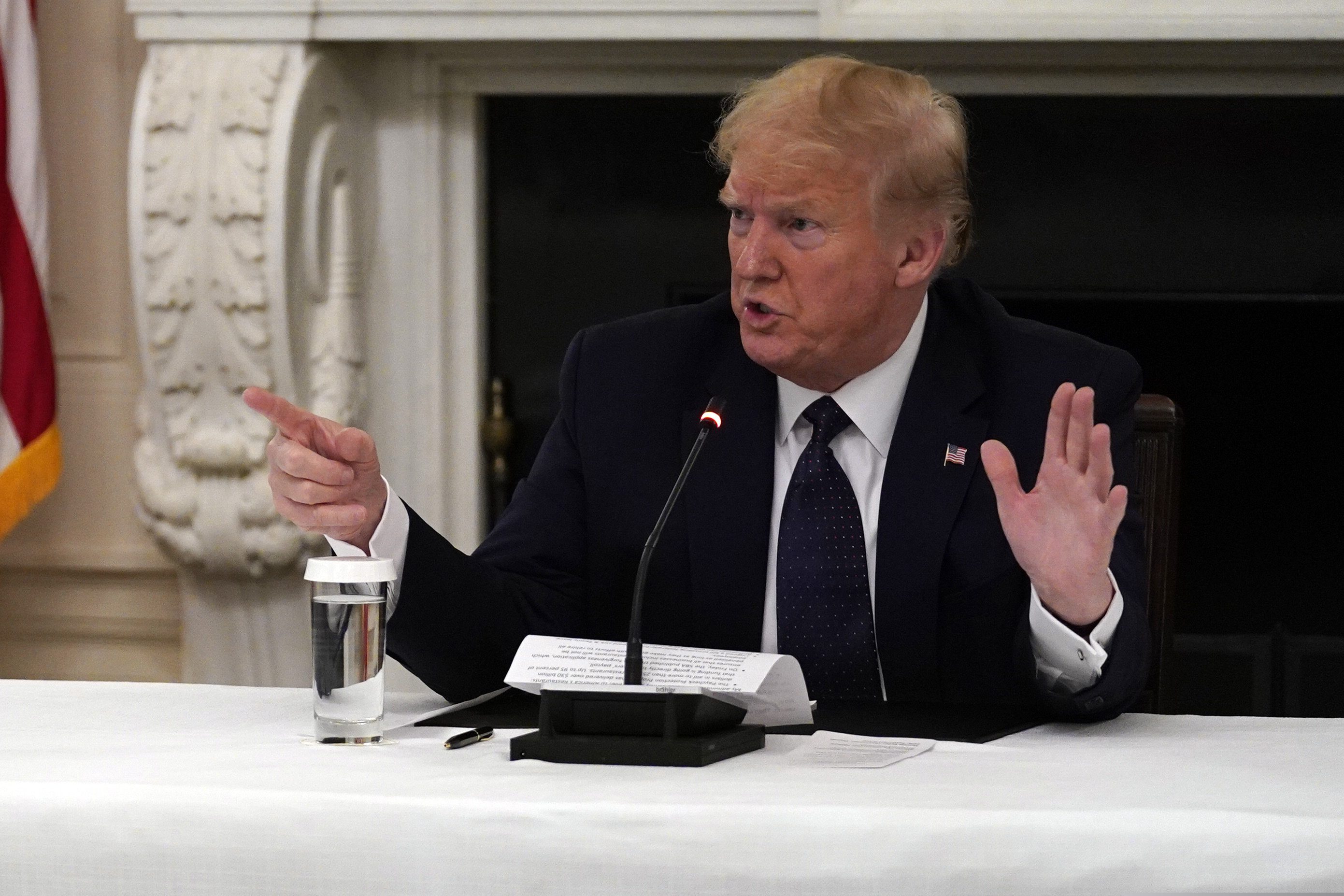 (Evan Vucci | AP) President Donald Trump tells reporters that he is taking zinc and hydroxychloroquine during a meeting with restaurant industry executives about the coronavirus response, in the State Dining Room of the White House, Monday, May 18, 2020, in Washington.