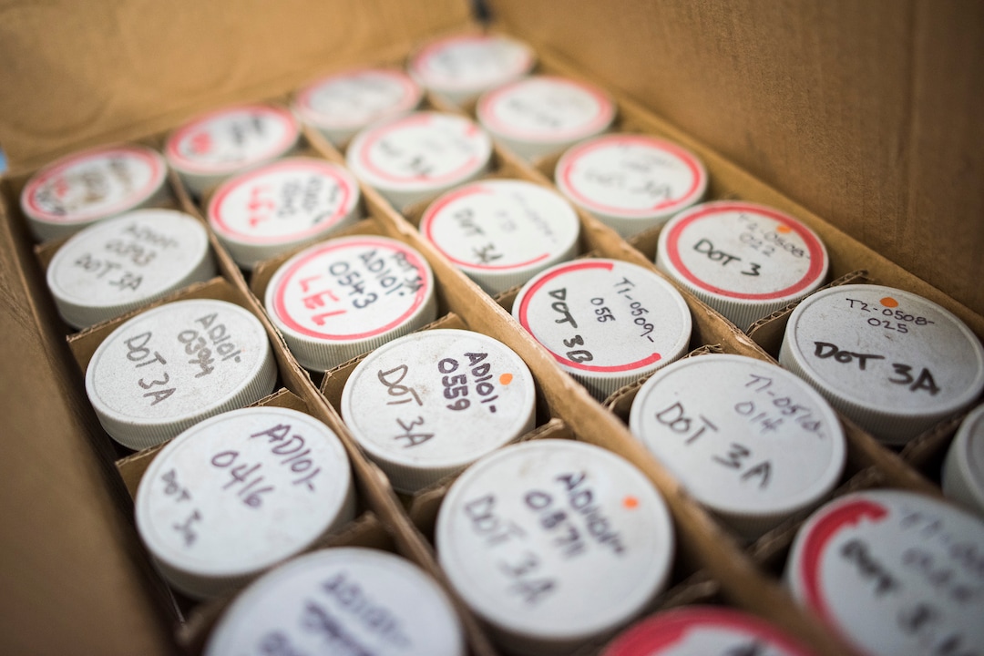 (Briana Scroggins  |  The Utah Investigative Journalism Project) Samples from drums are tested to understand the properties of their contents in a EPA testing trailer located outside of the Swift building in Ogden on Thursday, May 16, 2019. EPA On-scene Coordinator Paul Peronard said that he expects the total number of containers to reach about 60,000. The EPA started site clean up on April 1 and plan to finish by August 2019.