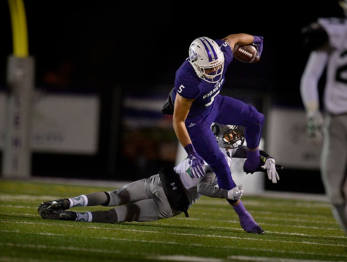 (Scott Sommerdorf   |  The Salt Lake Tribune)   Lehi TE Dallin Holker runs during first half play. Lehi led Olympus 26-0 late in the second half, Friday, September 22, 2017.