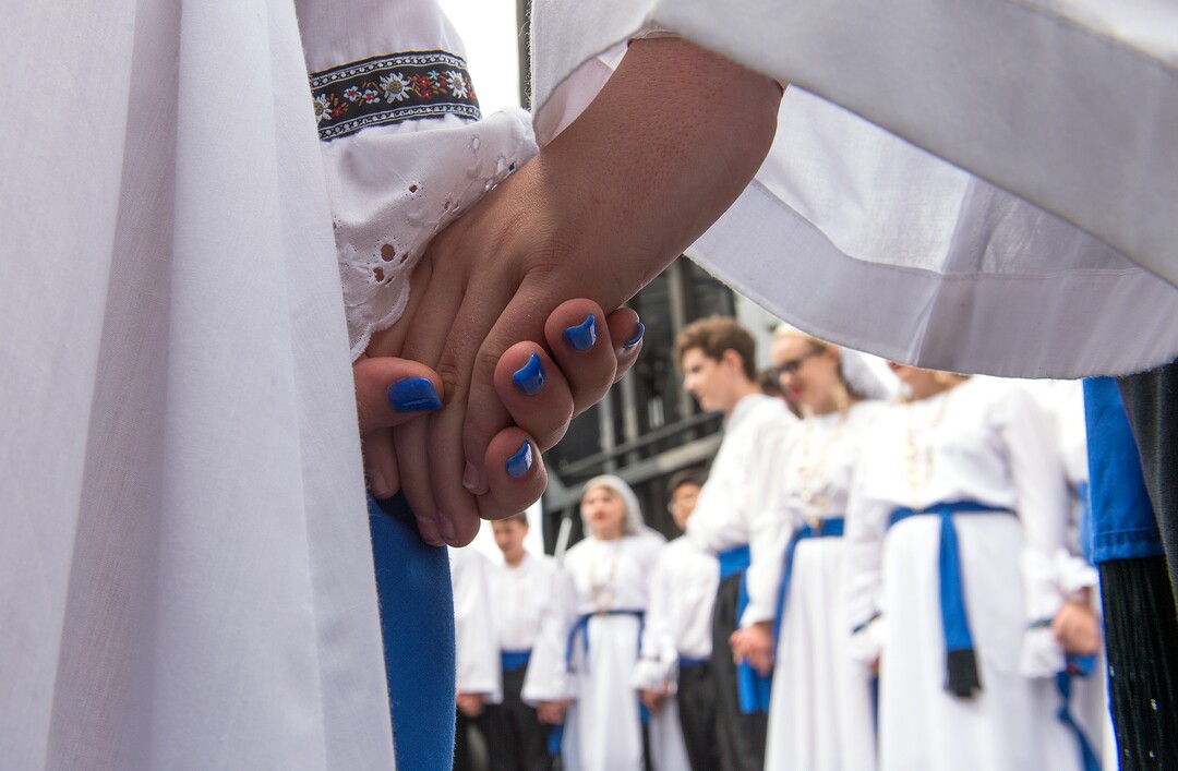 (Leah Hogsten  |  The Salt Lake Tribune) The Olympian Dancers hold hands in prayer before they perform at the 42nd Annual Greek Festival on the grounds of the Holy Trinity Cathedral Greek Orthodox Church. The three day festival offers a wide variety of food and pastries, Greek musicians and dance performances.