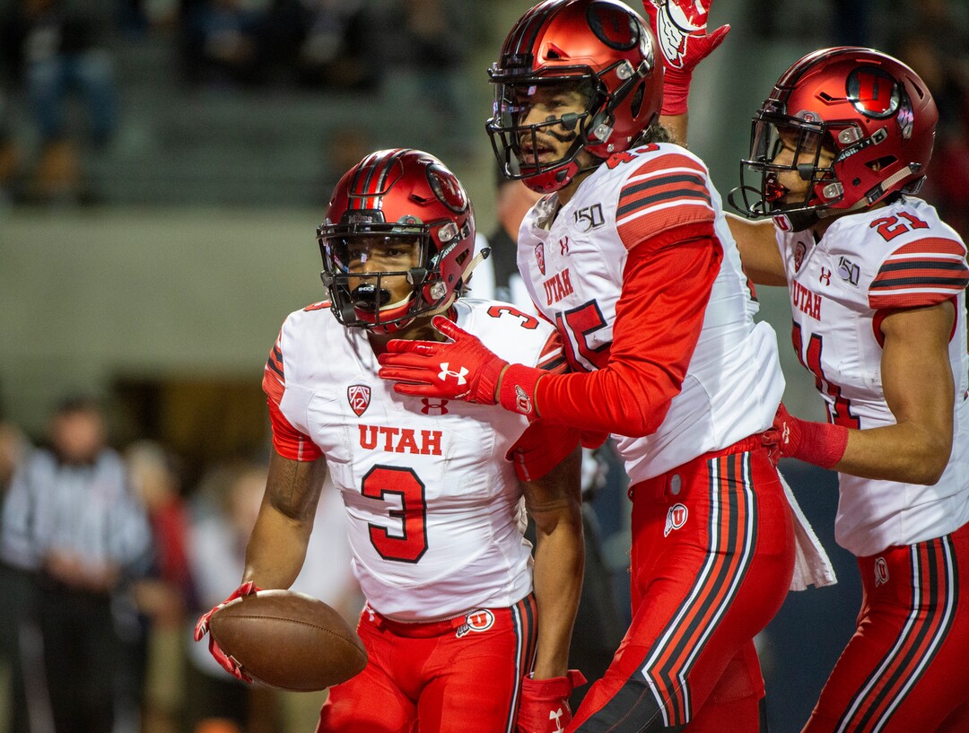(Rick Egan  |  The Salt Lake Tribune)     Utah Utes wide receiver Solomon Enis (21)Utah Utes wide receiver Samson Nacua (45) contraculates Utah Utes wide receiver Demari Simpkins (3) after he scored a touchdown, in PAC-12 action between the Utah Utes and the Arizona Wildcats in Tucson, Saturday, Nov. 23, 2019.