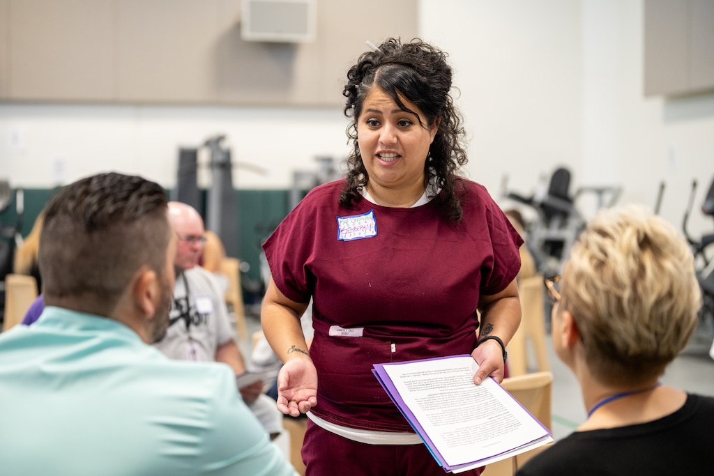 (Tanner Moulton | NinetyEight) Kimberly Cruz Romero practices her business pitch on Thursday, July 10, 2025, at the Utah State Correctional Facility.