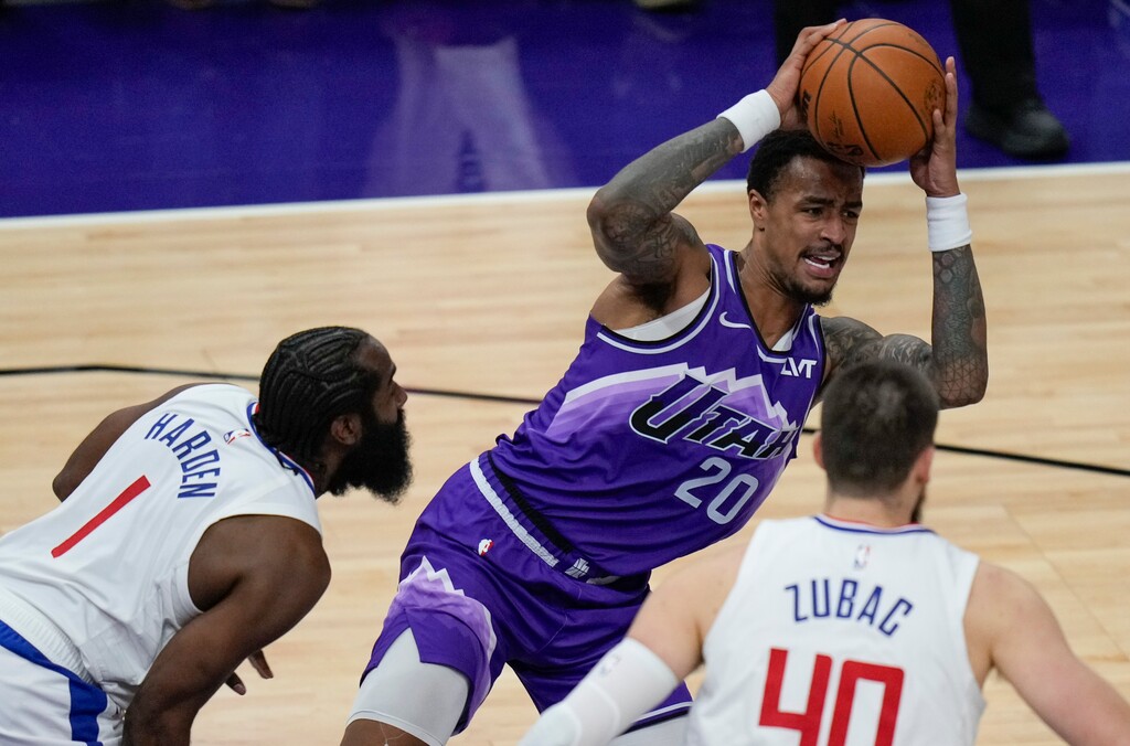 (Bethany Baker  |  The Salt Lake Tribune) Utah Jazz forward John Collins (20) passes the ball as LA Clippers center Ivica Zubac (40) and guard James Harden (1) defend at the Delta Center in Salt Lake City on Friday, Dec. 8, 2023.