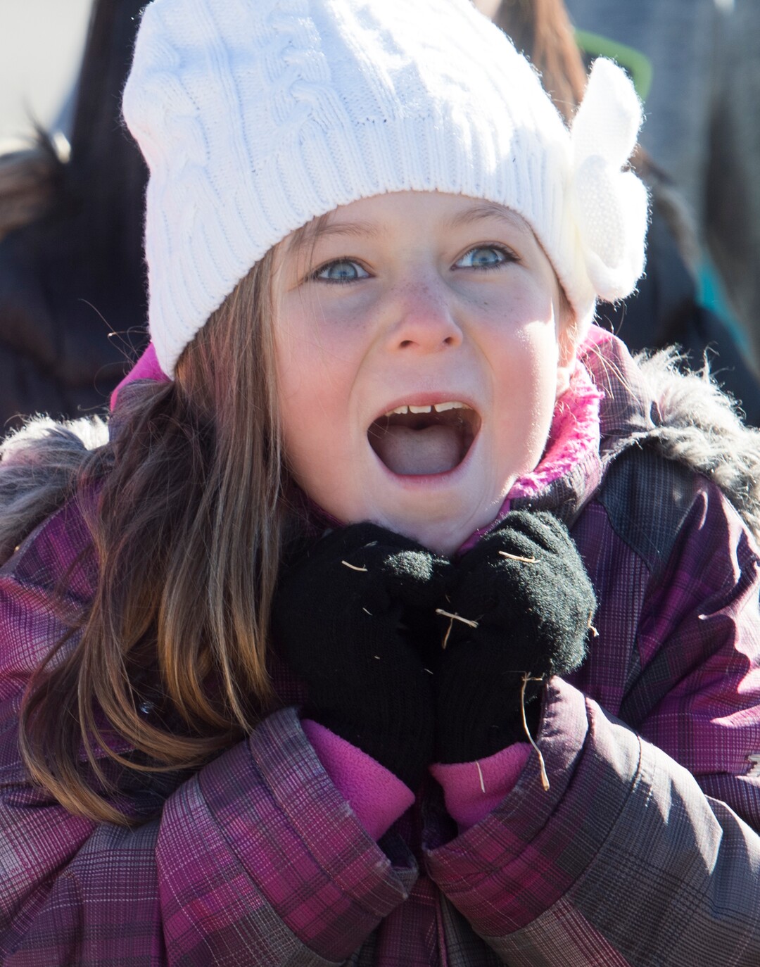 (Rick Egan  |  The Salt Lake Tribune) First grader, Rebecca Marshall reacts as Santa and Mrs Claus arrive in a helicopter, at Centennial Elementary School, in Roosevelt, Utah, as volunteer pilots from the Utah Wing of Angel Flight West,  brought school supplies and gifts to students  on their annual Santa Flight. Friday, December 8, 2017.
