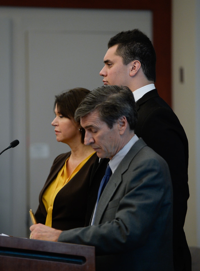 (Francisco Kjolseth  |  The Salt Lake Tribune)  Former Brighton High and University of Southern California linebacker Osa Masina, center, is joined by his defense attorney's Greg and Rebecca Skordas during his sentencing for sexual battery at the Matheson Courthouse in Salt Lake City on Tuesday, Dec. 5, 2017. Masina was sentenced to 365 days in jail, followed by two years on probation.