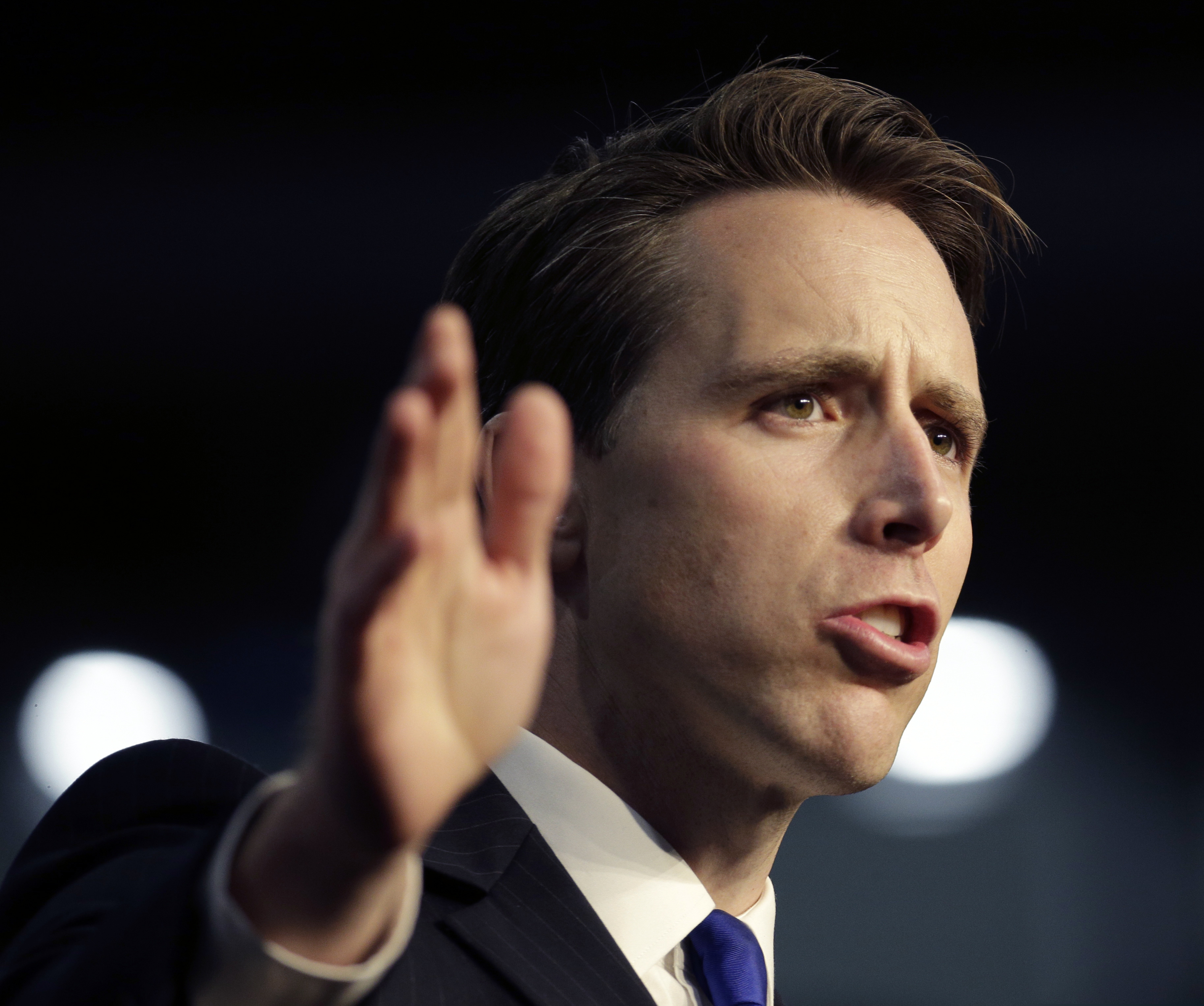 (Charlie Riedel | AP Photo) Republican Senate candidate Josh Hawley waves as he comes onto the stage during a rally hosted by the American Conservative Union Friday, Nov. 2, 2018, in Kansas City, Mo.